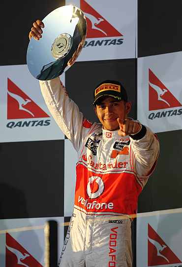 Lewis Hamilton celebrates after the Australian Grand Prix