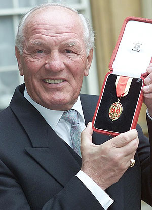 Former boxing champion Henry Cooper after being knighted by the Queen in February 2000