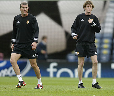 Zinedine Zidane (left) with Steve McManaman before a Champions League match in 2002