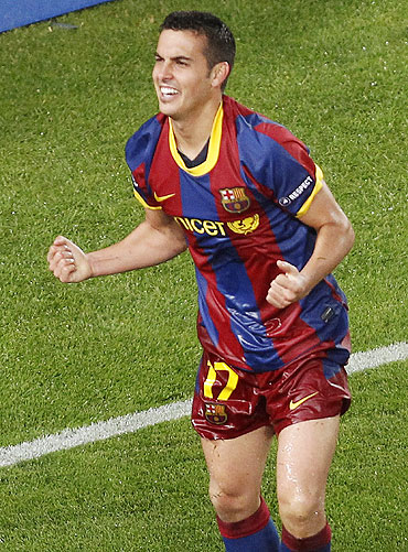 Barcelona's Pedro Rodriguez celebrates after scoring against Real Madrid