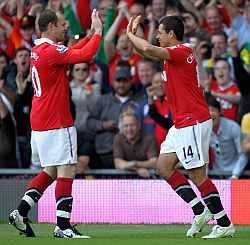 Javier Hernandes celebrates with Rooney