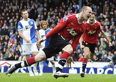 Wayne Rooney celebrates after scoring against Blackburn