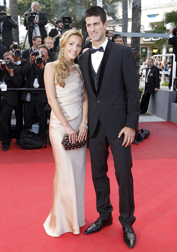Serbian tennis player Novak Djokovic and his girlfriend Jelena Ristic arrive on the red carpet at the 64th Cannes Film Festival
