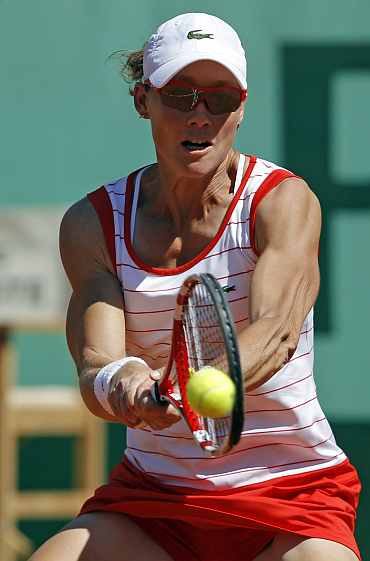 Samantha Stosur returns during her French Open match against Iveta Benesova