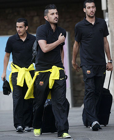 Barcelona's Pedro Rodriguez (left to right), David Villa and Sergio Busquets