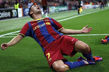 Barcelona's David Villa reacts after scoring a goal against Manchester United