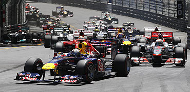 Red Bull's Sebastian Vettel leads the race at the start of the Monaco F1 Grand Prix