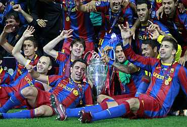 Barcelona players celebrate after winning the Champions League final against Manchester United on Saturday