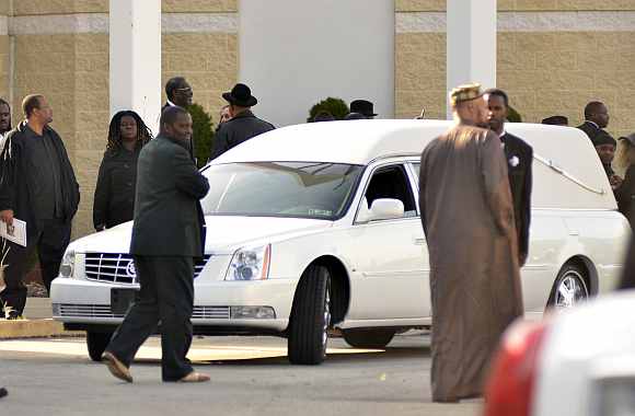 The hearse of boxer Joe Frazier sits at the Enon Tabernacle Baptist church during his funeral in Philadelphia