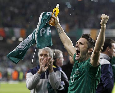Ireland's Robbie Keane celebrates after qualifying against Estonia in their Euro 2012 playoff match on Tuesday