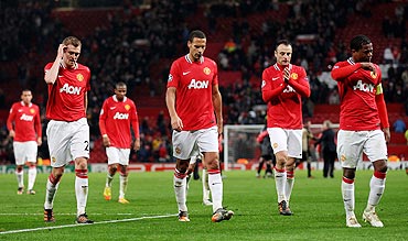 Dejected looking Manchester United players