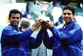 Leander Paes and Mahesh Bhupathi after their triumph at the French Open in 1999