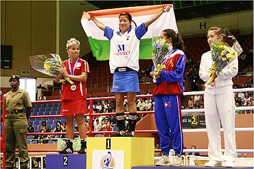 India's Mary Kom (centre) after winning the World Championships