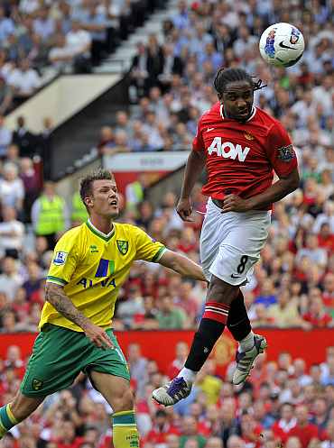 Manchester United's Anderson heads the ball into the goal against Norwich City