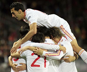 Spain national football team players celebrate against the Czech Republic during their Euro 2012 Group I qualifying football match