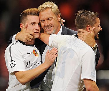 Thorsten Fink ex-manager of Basel celebrates with Taulant Xhaka (left) and Markus Steinhofer (right)