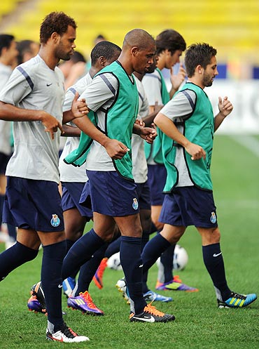 FC Porto players excercise during a training session