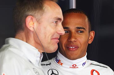 Lewis Hamilton (right) of McLaren Mercedes and his Team Principal Martin Whitmarsh
