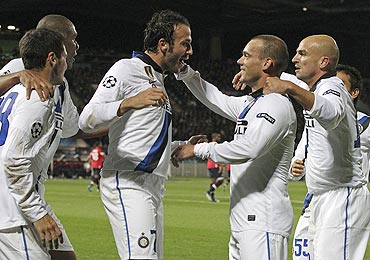 Inter Milan's Giampaolo Pazzini (centre) is congratulated by teammates after his goal against Lille