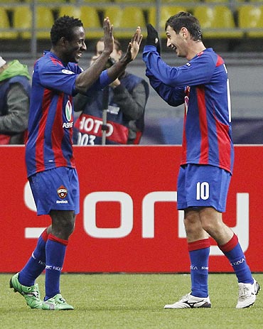CSKA Moscow's Seydou Doumbia celebrates with teammate Alan Dzagoev after scoring against Trabzonspor