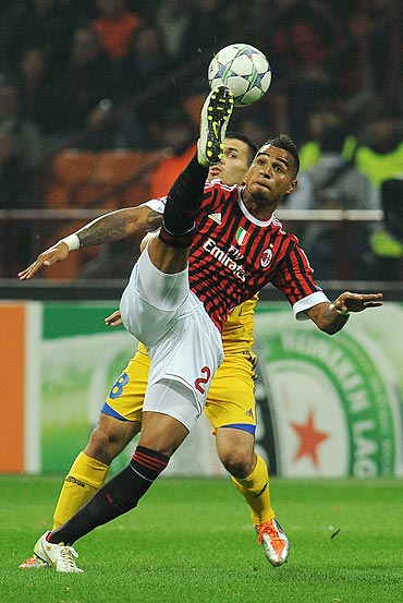 AC Milan's Kevin-Prince Boateng is challenged by Aleksandr Volodko of Borisov