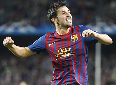 Barcelona David Villa celebrates after scoring against Viktoria Plzen