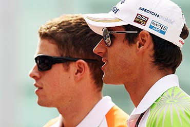 Force India drivers Paul di Resta and Adrian Sutil (right)