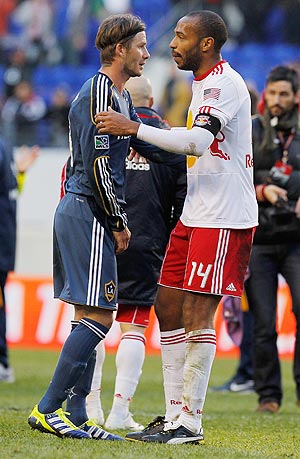 David Beckham of the Los Angeles Galaxy and Thierry Henry (right) of the New York Red Bulls