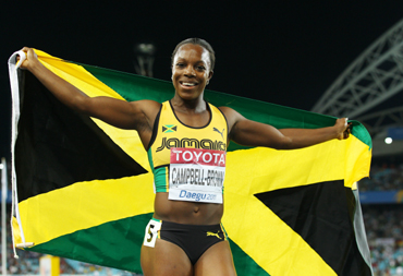 Veronica Campbell-Brown of Jamaica celebrates winning the women's 200 metres final during day seven of 13th IAAF World Athletics Championships at Daegu