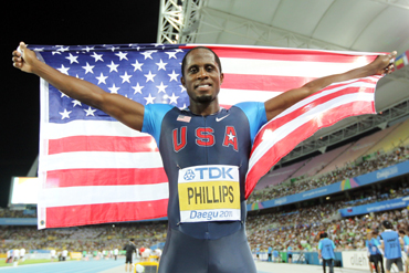 Dwight Phillips of the USA celebrates his victory in the men's long jump final during day seven of 13th IAAF World Athletics Championships at Daegu Stadium