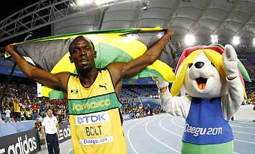 Usain Bolt reacts after claiming gold in the men's 200 metres final