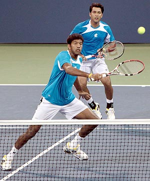 Rohan Bopanna and Aisam Qureshi in action against Paul Hanley and Dick Norman on Sunday