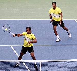 Mahesh Bhupathi and Leander Paes in action against Somdev Devvarman and Treat Conrad Huey during their doubles tie in New York on Monday