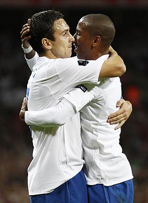 England's Ashley Young (right) celebrates with Stewart Downing after scoring against Wales