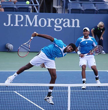 Rohan Bopanna (left) returns as Aisam Qureshi looks on during the semis match of the US Open doubles