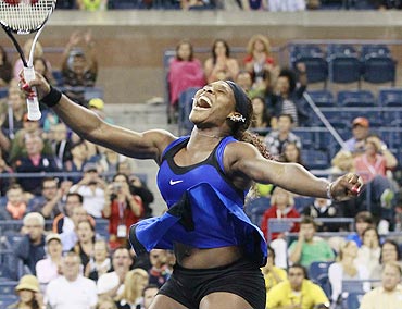 Serena Williams celebrates her victory against Caroline Wozniacki in the US Open semi-finals on Saturday