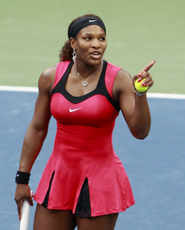 Serena Williams of the U.S. argues with the chair umpire during her match against Samantha Stosur of Australia in the finals at the U.S. Open