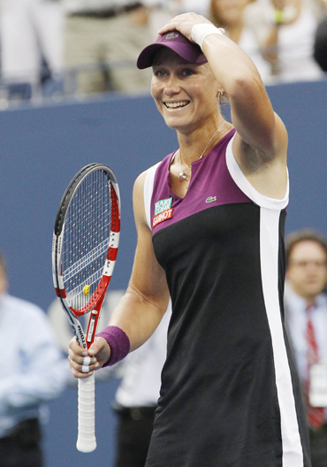 Samantha Stosur of Australia reacts after winning her finals match, defeating Serena Williams of the U.S., at the U.S. Open