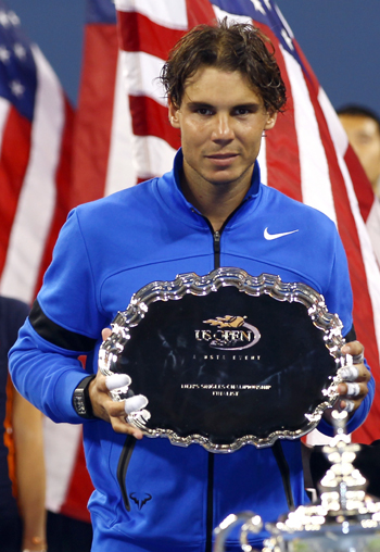 Rafael Nadal holds up the runners up trophy after the US Open final
