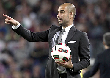 Barcelona's coach Pep Guardiola gestures during their Spanish first division soccer match