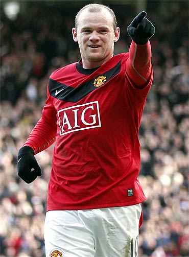 Manchester United's Wayne Rooney celebrates after scoring a goal