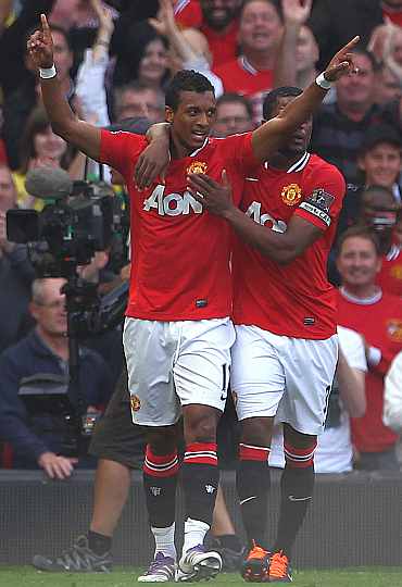 Manchester United's Nani celebrates after scoring against Chelsea at Old Trafford