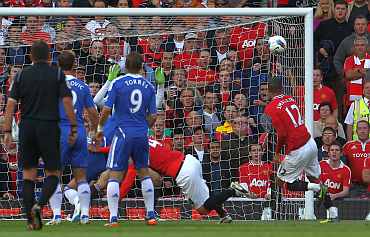 Chris Smalling scores for Manchester United against Chelsea