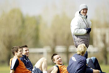 Claudio Ranieri (right) with Chelsea players during a training session
