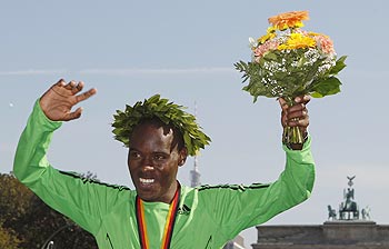 Patrick Makau of Kenya celebrates after winning the Berlin Marathon in Berlin, on Sunday