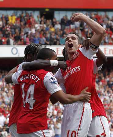 Arsenal's Robin van Persie celebrates after scoring