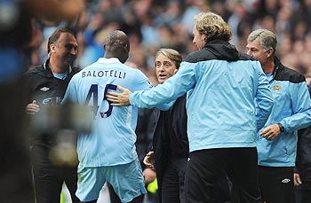 Manchester City players with manager