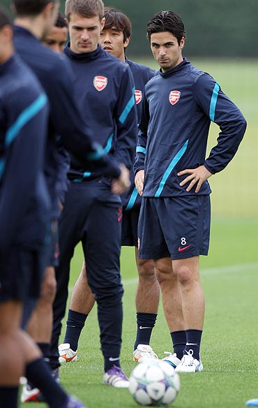 Mikel Arteta of Arsenal looks on during a training session