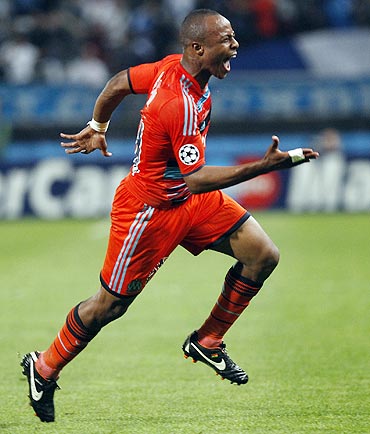 Olympique Marseille's Andre Ayew celebrates after scoring against Borussia Dortmund