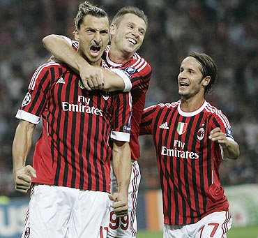 Zlatan Ibrahimovic (left) celebrates with teammates after scoring against Viktoria Plzen